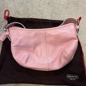 Coach small leather hobo, light pink with silver details. Used once.